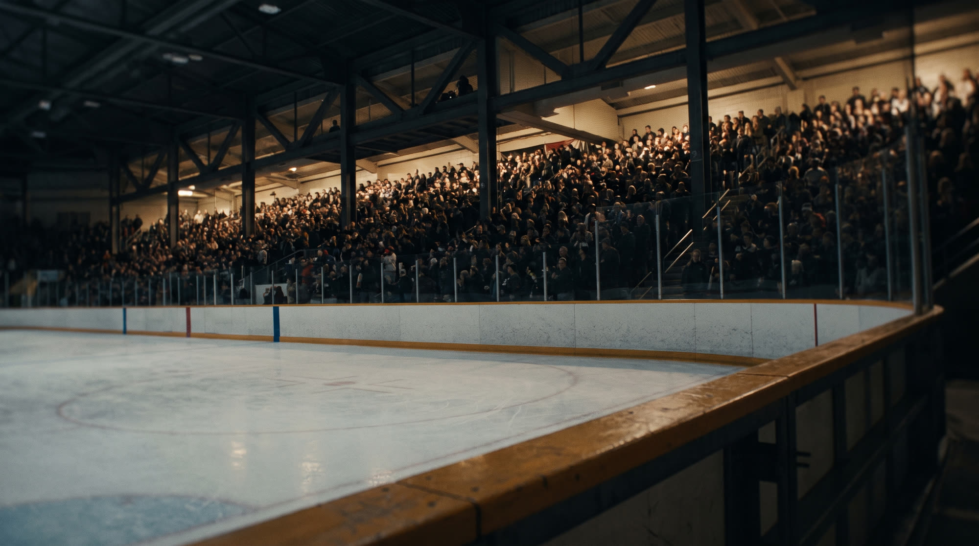 A packed arena bowl from ice level